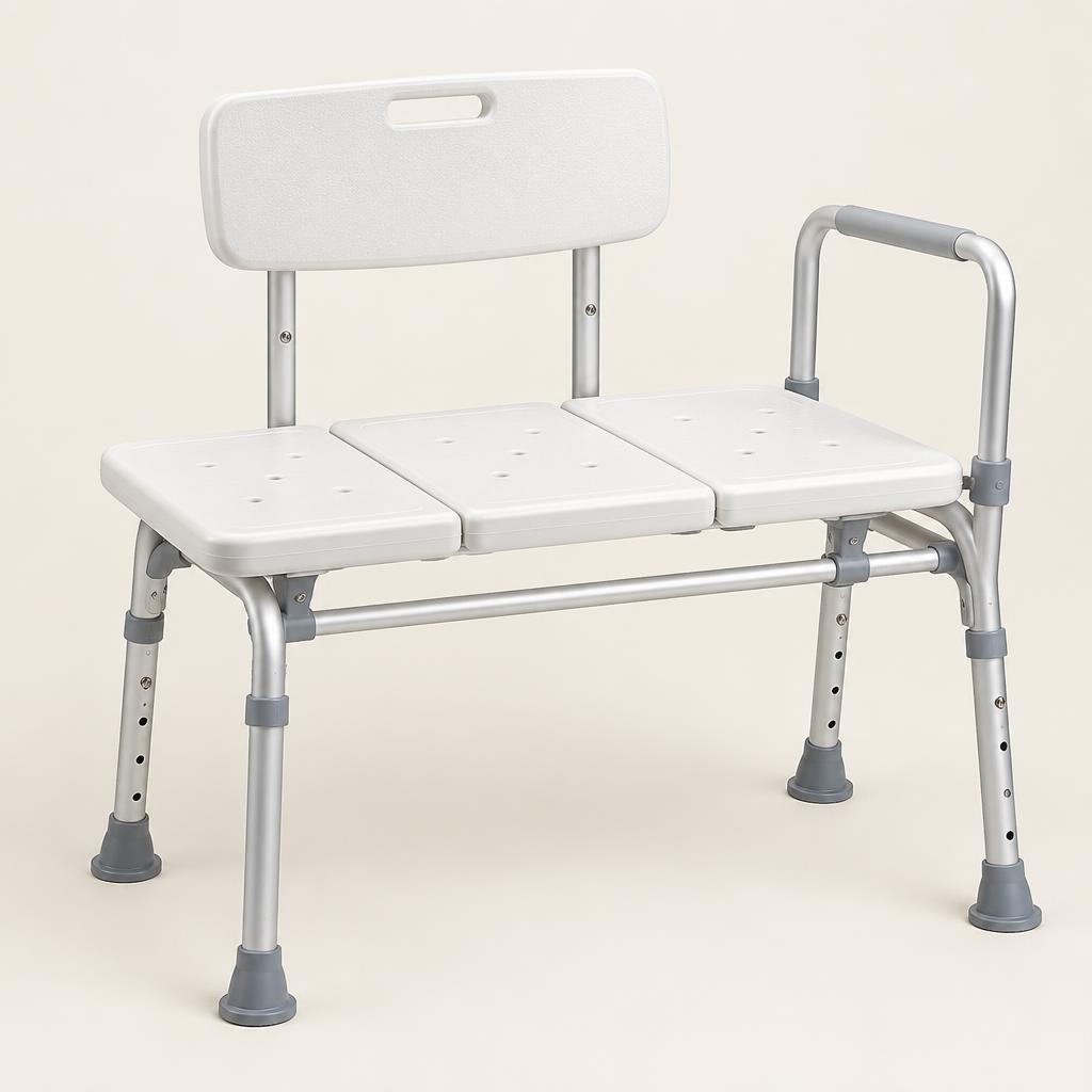 White bath transfer bench with backrest positioned across a bath